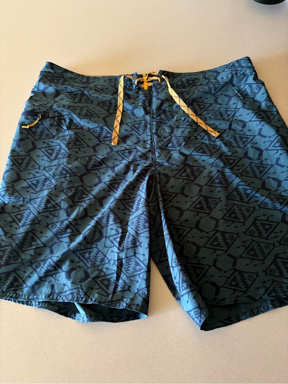 Patagonia Teal Patterned Swim Board Shorts with Yellow Drawcord